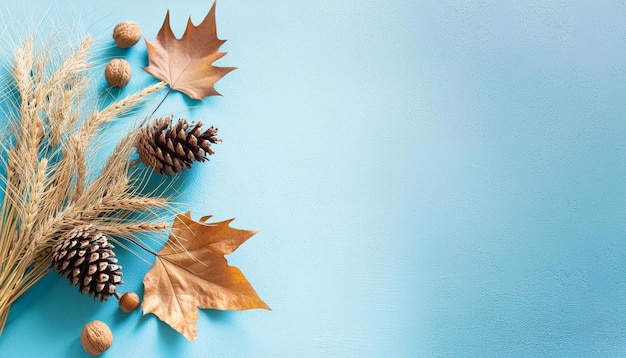 Colorful fall leaves nuts pumpkin and pine cones Corner border over a rustic banner background