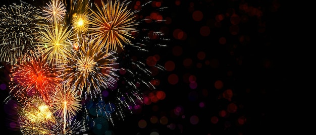 Colorful firework with bokeh background. New Year celebration, Abstract holiday background