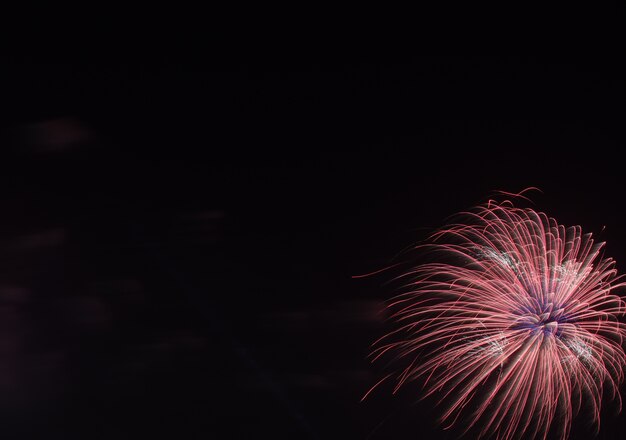 Photo colorful fireworks on the black sky background over-water