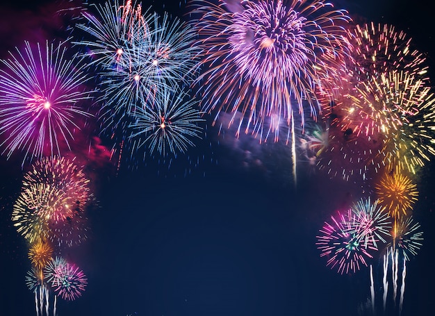 Colorful fireworks on the black sky background 