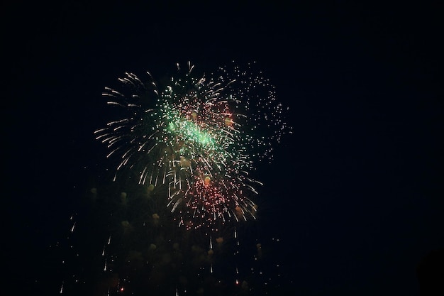 Colorful fireworks on dark sky