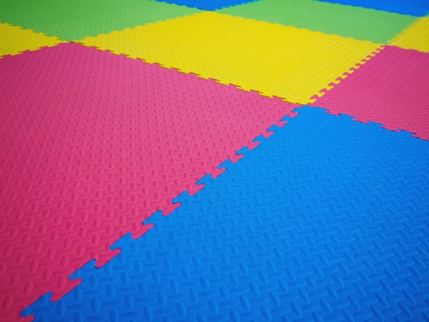 Colorful floor tiles in play room