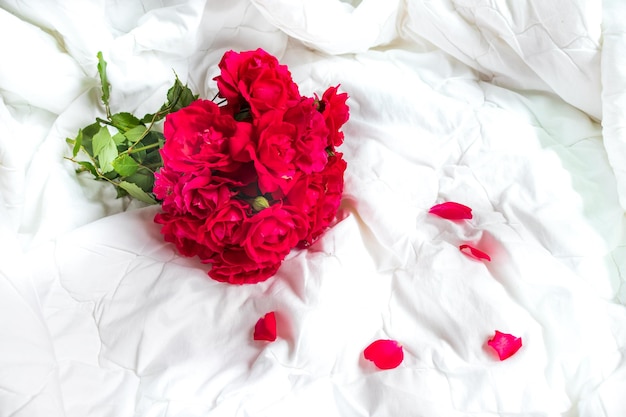 Colorful flower bouquet from red roses isolated on white background Closeup