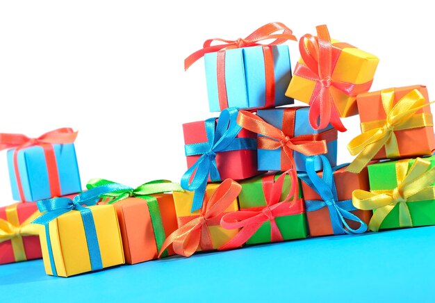 Colorful gifts close-up on a white background