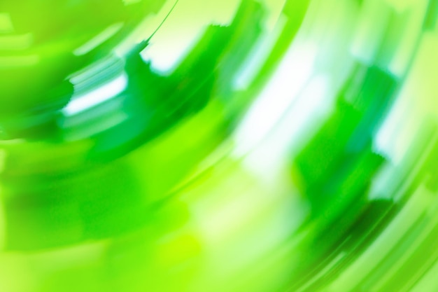 Colorful green defocused texture for your design Blurred green natural background with bokeh