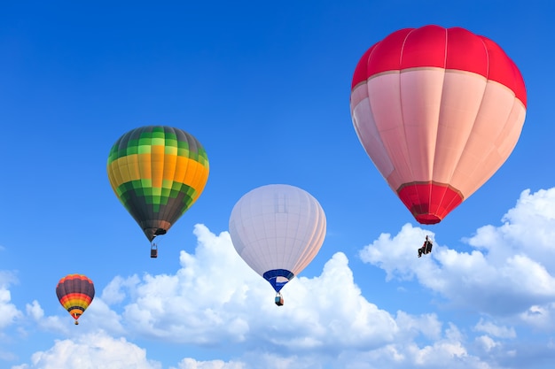 Colorful Hot Air Balloons in Flight over blue sky