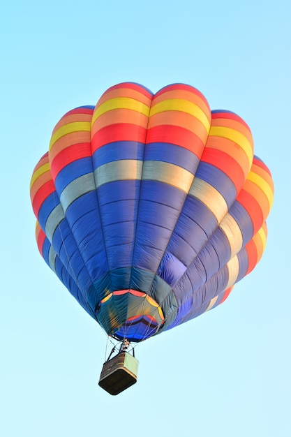 Colorful Hot Air Balloons in Flight over blue sky