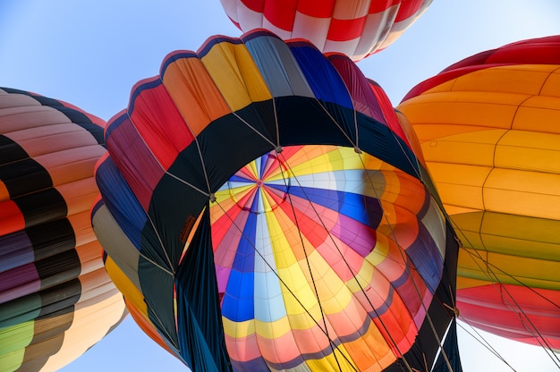 Colorful hot air balloons with igniting an inflatable