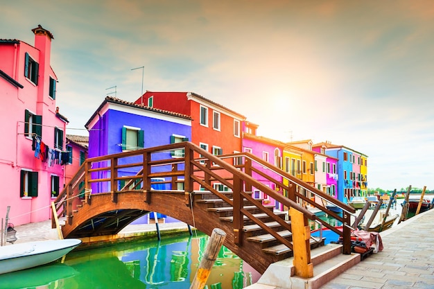 Colorful houses on the canal in Burano island, Venice, Italy. Famous travel destination