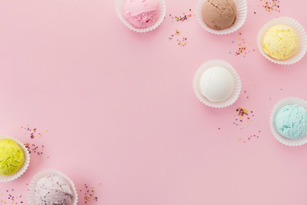 Colorful ice cream scoops in paper cups