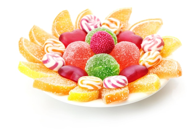 Colorful jelly candies on plate isolated on white