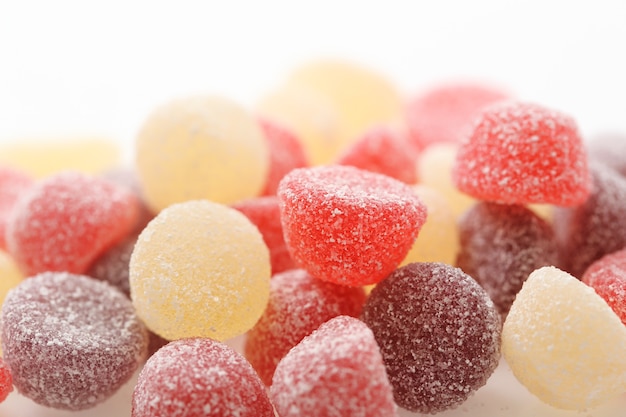 Colorful jelly sugar candies close up isolated in white surface