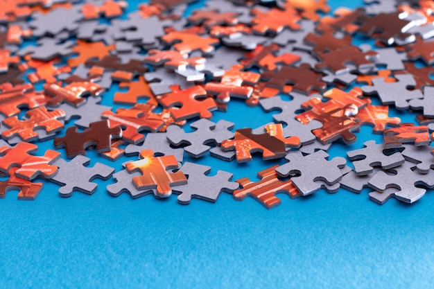 Colorful jigsaw puzzle on blue background