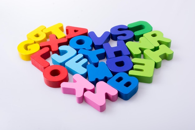 Colorful letter blocks shape heart