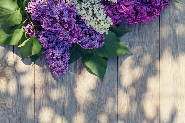 Colorful lilac flowers on garden table