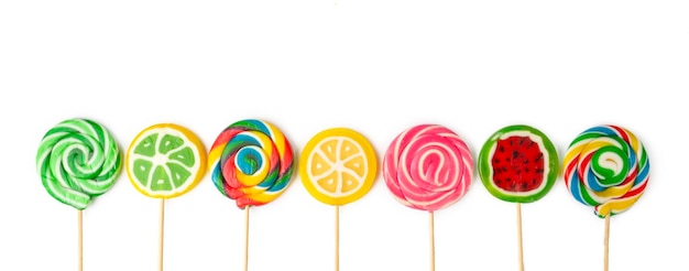 Colorful lollipops, colorful candies on a white background