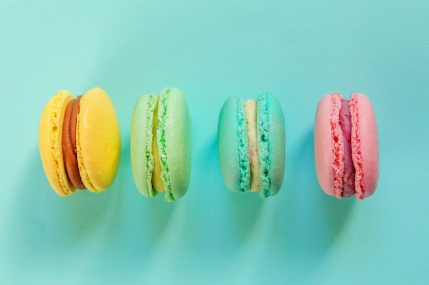 Colorful macaron on blue background