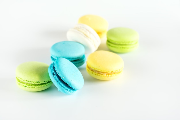 Colorful Macarons Yellow Blue Green Macarons French Dessert Tasty Macarons White Background Copy Space