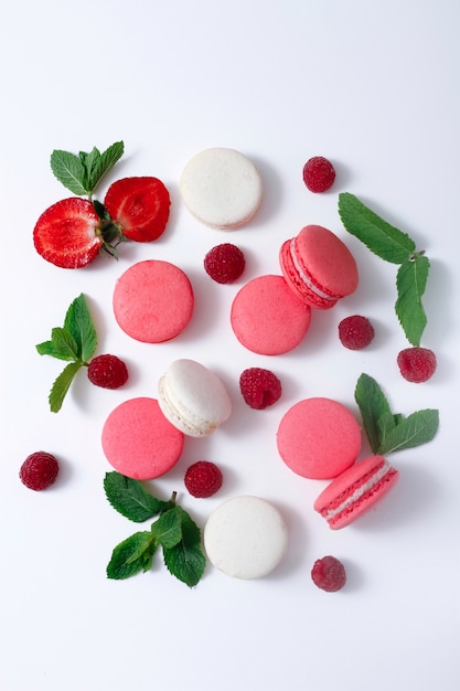 colorful macaroons on white plate