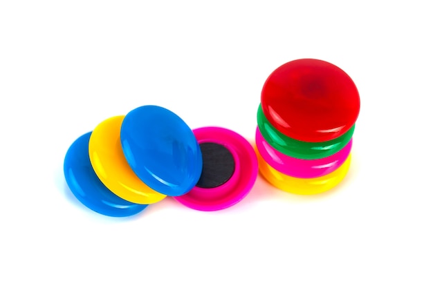 Colorful magnets - holders on a white background.