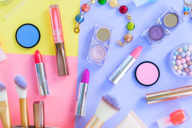 Colorful make up flat lay scene