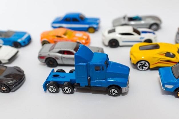 Photo colorful miniature toy car collection on light background selective focus