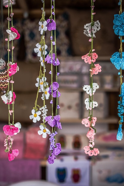 Colorful needle work embroidery flowers as a background