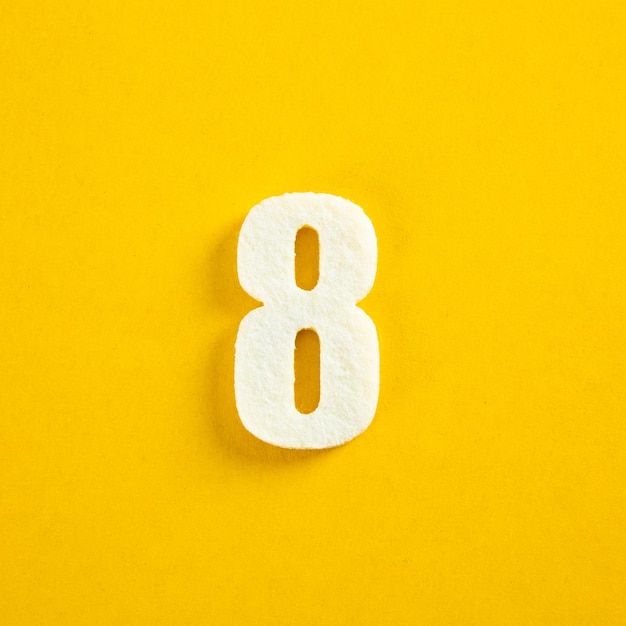 colorful number on yellow background