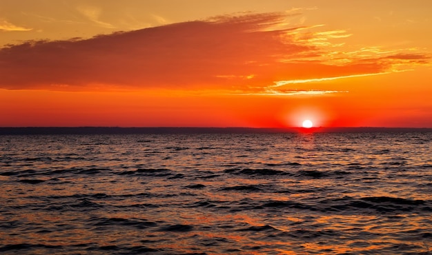 Colorful ocean beach sunrise. Dawn over the sea. Nature composition