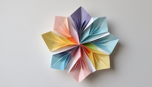 Photo a colorful origami cross is on a white background