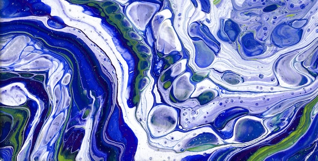 A colorful painting of a blue and green swirl.