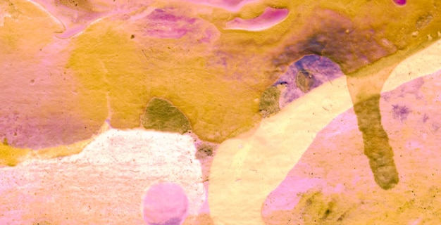 A colorful painting of a rock with a yellow background and a purple background.