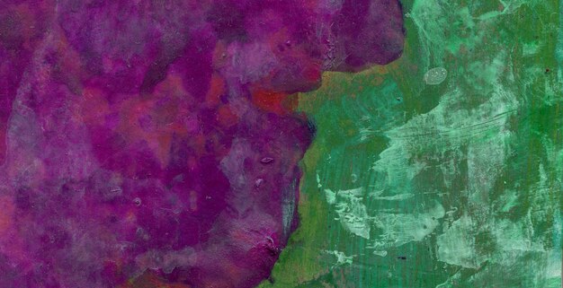 A colorful painting with a green background and purple and green paint.