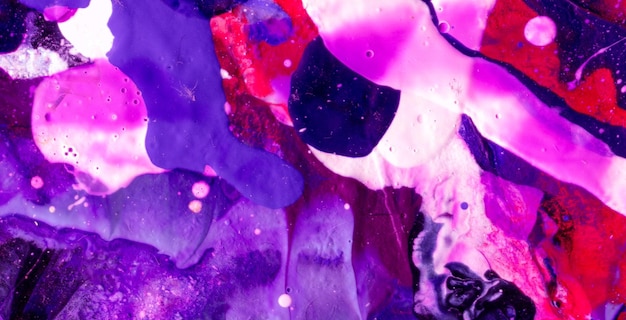 A colorful painting with purple and pink paint