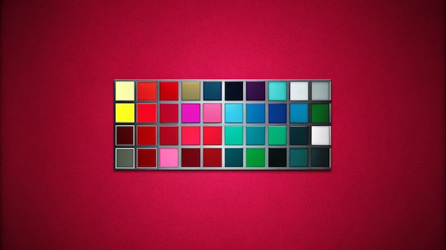 Photo a colorful palette of squares arranged in a grid against a red background