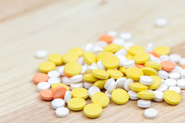 Colorful pills and drugs in close up. Assorted pills and drugs in medicine.