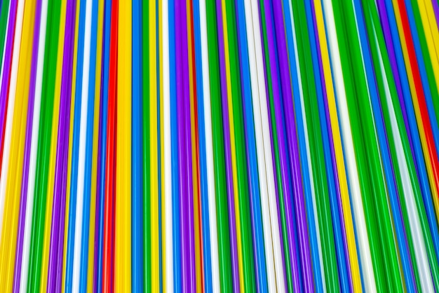 Colorful plastic tubules background. Top view.