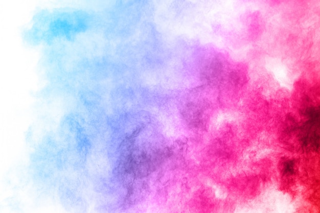 Colorful powder explosion on white background.  