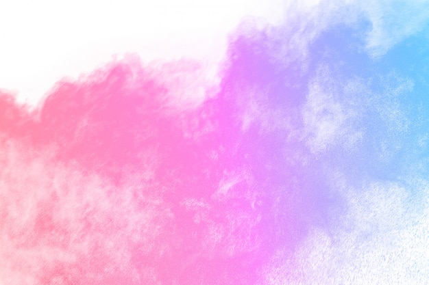 Colorful powder explosion on white background.