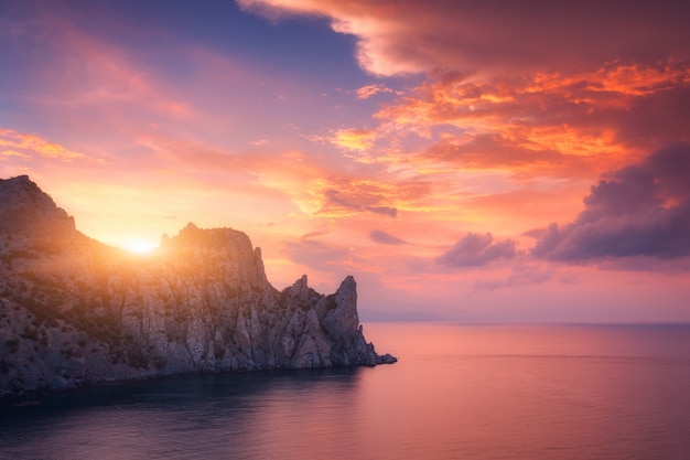 Colorful red sky. Mountain landscape at sunset