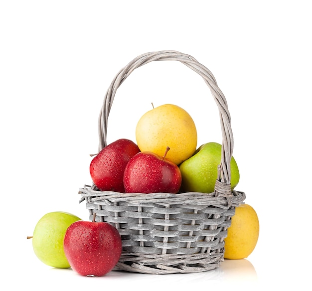 Colorful ripe apple fruits in basket