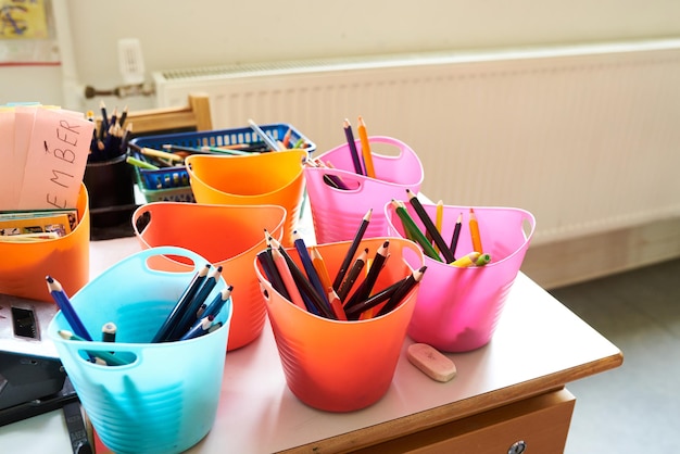 Colorful school art supplies in a classroom