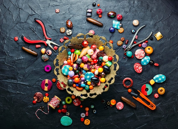 Colorful seed beads of different sizes.Making of handmade jewellery