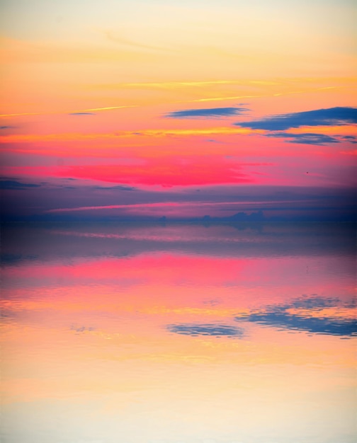 Colorful sky at sunset reflected in the water