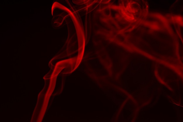 Colorful smoke close-up on a black background