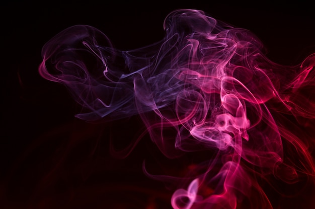 Colorful smoke close-up on a black background