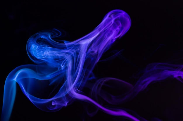 Colorful smoke close-up on a black background