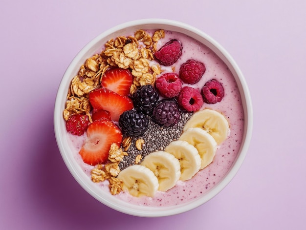 Photo a colorful smoothie bowl topped with fruits and granola ideal for a healthy breakfast