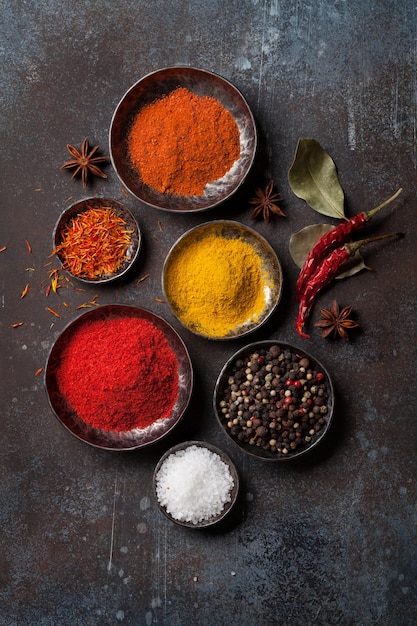 Colorful spices on stone table