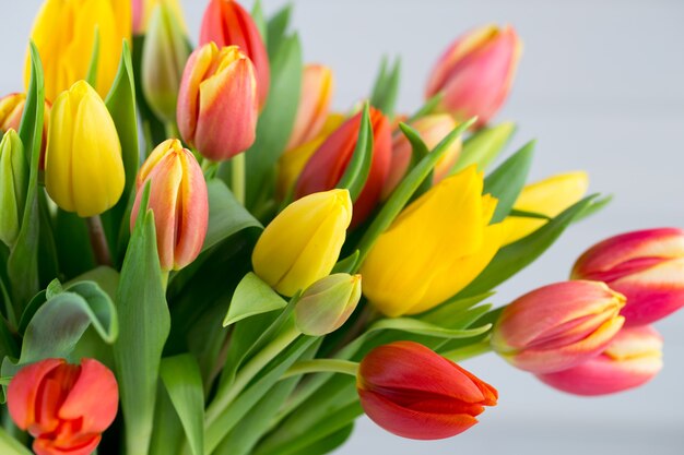 A colorful spring greetings card with flowers for Easter, Mother's Day.